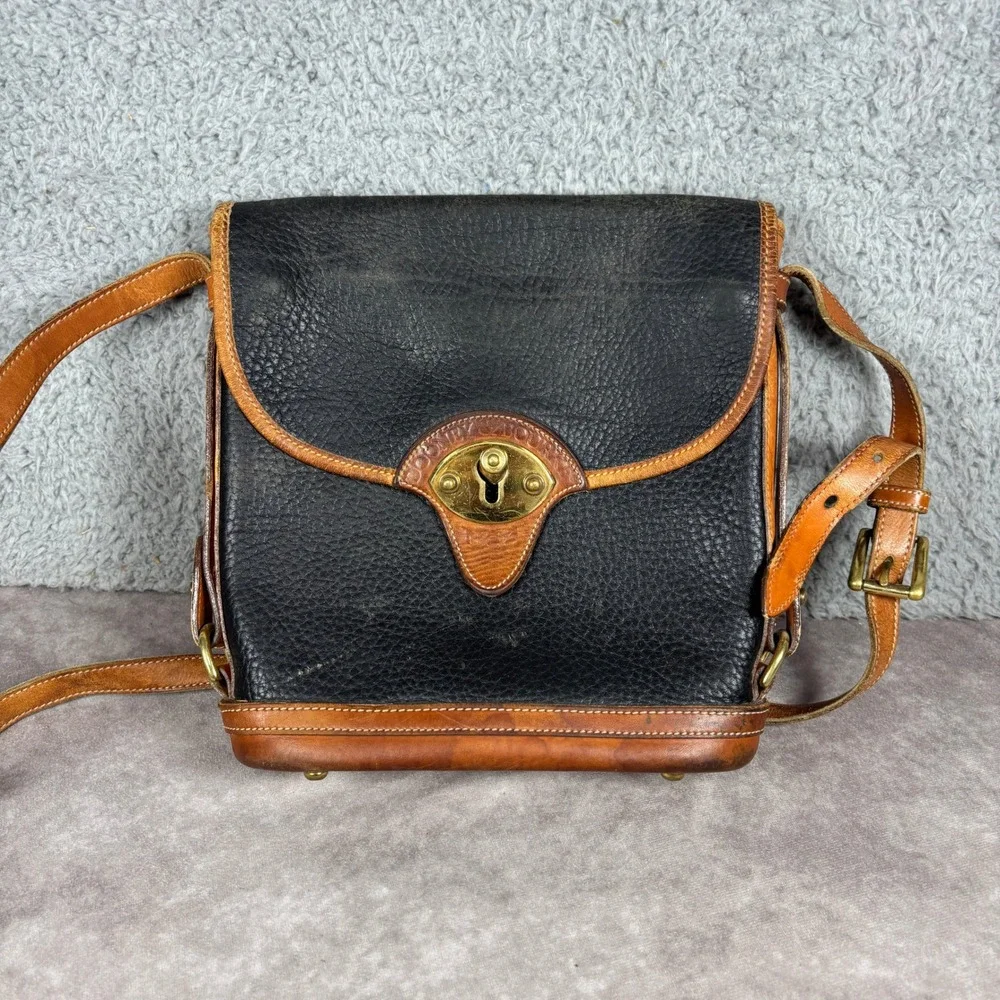 Dooney & Bourke Crossbody Bag Womens Medium Black Tan All Weather Leather Toggle